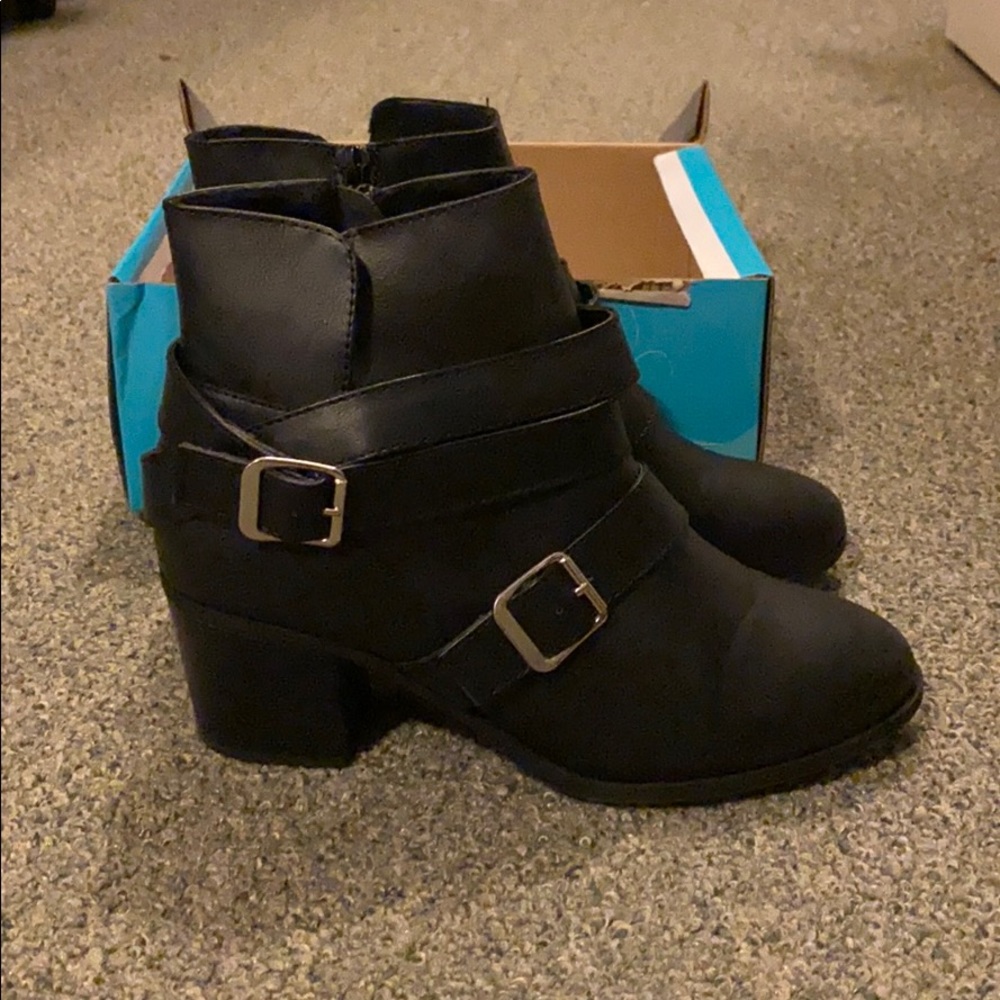 Short heeled black booties